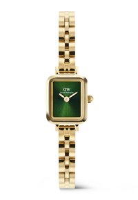 Gold linked bracelet watch with square green dial, gold hands, and "DW Daniel Wellington" logo on the face.