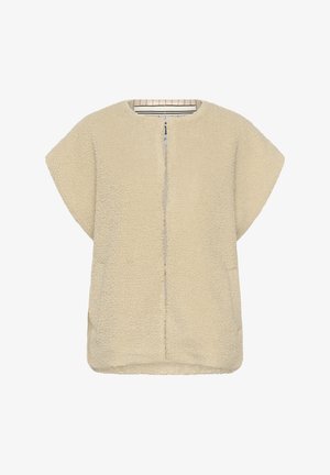 Vêtement d'extérieur en polaire beige et duveteux avec des manches courtes, fermeture éclair à l'avant et deux poches latérales. Texture douce avec une coupe décontractée et ample.