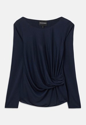 Haut à manches longues bleu marine avec un décolleté arrondi et un détail de nœud drapé à la taille. Fabriqué à partir d'un tissu doux et extensible pour le confort.