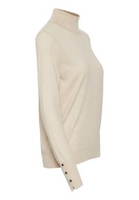 Beige turtleneck neuletakki pitkillä hihoilla, jossa on ribbauskaulus ja nappikoristeet hihansuissa. Valmistettu pehmeästä neulekankaasta.