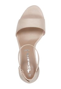Sandale ouverte en daim beige avec une large bride avant et une bride de cheville. Dotée d'une semelle intérieure lisse et d'un design minimaliste.