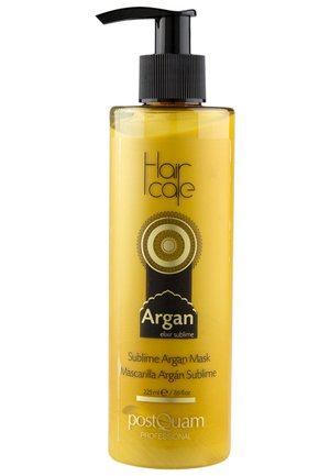 Botella amarilla del producto para el cuidado del cabello PostQuam Professional Sublime Argan Mask con dispensador de bomba negro y etiqueta decorativa.