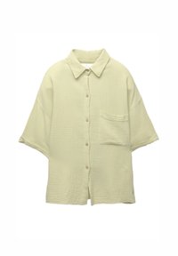 Lichtgroene korte mouw blouse met knopen, gemaakt van een gestructureerde stof, met een borstzak en een relaxed fit. Vier knopen aan de voorkant.