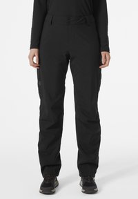 Zwarte waterdichte broek met een knoopsluiting en riemlussen. Heeft een rechte snit en cargopockets aan de zijkanten. Glad textuur.