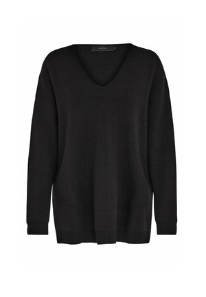 Must mustvalguga, vabalt langetav sviiter V-kaelusega, pikkade varrukatega ja ribavarrukatega. Pehme tekstuur, minimaalne disain, ilma nähtavate mustrite või aktsentideta.