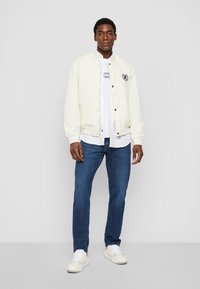 Tommy Hilfiger REVERSIBLE VARSITY JACKET - Bomber Jacket - calico