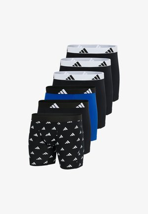 Sju par stretchtygs kalsonger i svart och blått, med vita elastiska midjeband med upprepande logomönster.