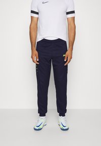 JAKO ALLROUND - Jogginghose - marine/neongelb