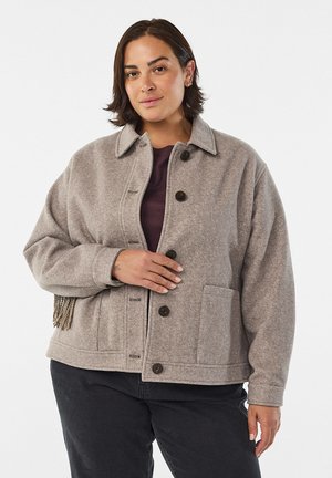 Gray wool-blend jacket with a collar, button closure, side pockets, and fringe detail. Features a relaxed fit and textured surface.