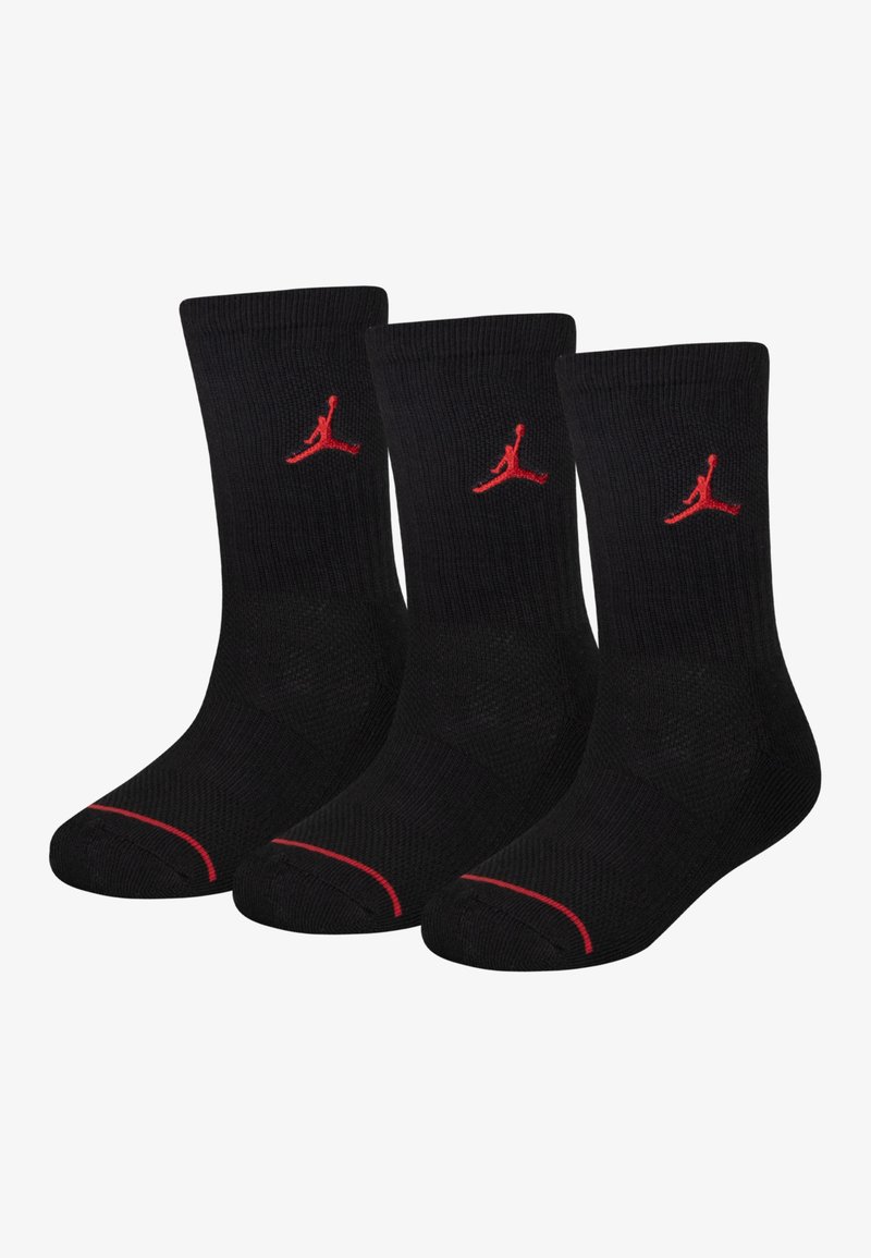 Zwarte crew sokken met het rode Jumpman-logo op de enkel, voorzien van een geribbelde textuur en contrasterende rode strepen bij de tenen. Verpakt per drie.