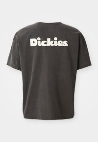 Dark gray short-sleeve T-shirt with large white "Dickies" logo printed across the upper back.