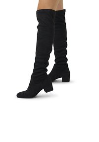 Schwarze Overknee-Stiefel aus weichem Wildleder, mit runder Zehenpartie und blockiertem Absatz. Das Design verfügt über eine lässige Textur.