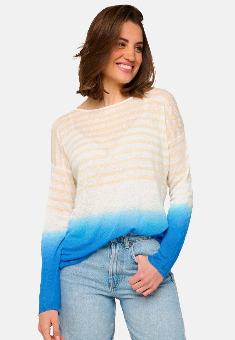 Leichter, langärmeliger Pullover mit horizontalen beigen Streifen, einem verlaufenden blauen Saum und lässiger Passform. Der Stoff wirkt weich und strukturiert.