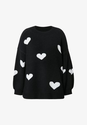 Schwarzer Pullover mit lockerem Schnitt und überschnittenen Schultern, der mit weißen Herzmustern verziert ist. Hergestellt aus einem weichen, strukturierten Stoff mit geripptem Kragen.