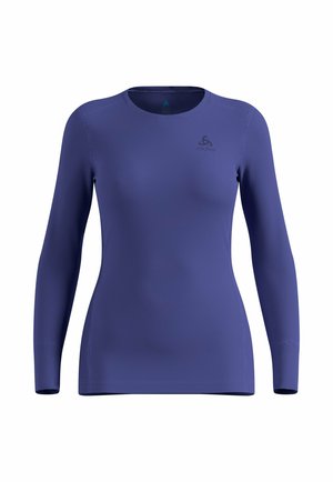 Long-sleeve, fitted athletic shirt in solid dark blue with round neck and small logo on upper left chest.