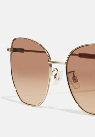 McQ Alexander McQueen Óculos de sol - gold-coloured/brown
