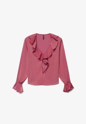 Blouse rose poudré à manches longues avec col en V bordé de volants et poignets volantés, posée à plat sur fond blanc.