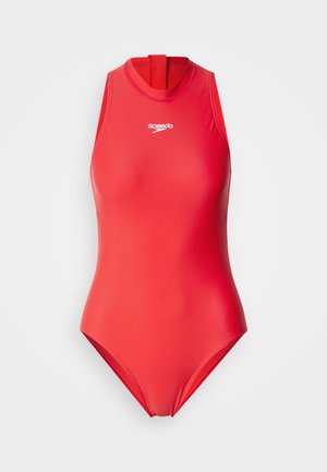 Maillot de bain rouge sans manches avec un col montant, en tissu lisse et extensible. Il présente un logo sur la poitrine et une fermeture éclair à l'arrière.