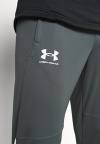Under Armour Pantalones deportivos - pitch gray