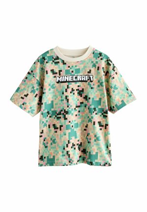 Green and beige short-sleeve t-shirt with pixelated camouflage pattern; features the "MINECRAFT" logo in black across the chest.