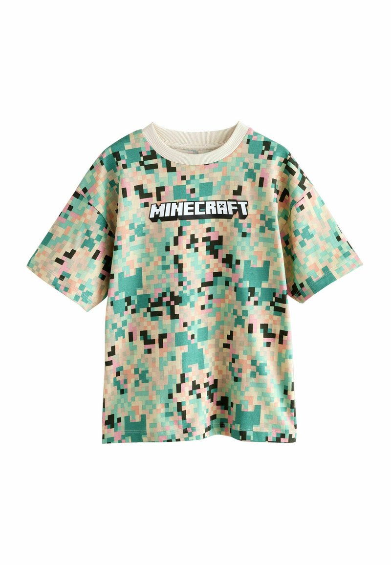 Green and beige short-sleeve t-shirt with pixelated camouflage pattern; features the "MINECRAFT" logo in black across the chest.