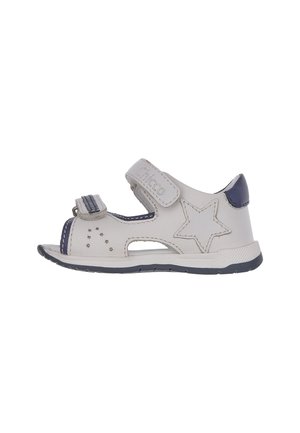 Sandalo bianco e blu navy per bambini con dettaglio a stella, punta aperta e due cinturini in velcro regolabili per una calzata sicura.