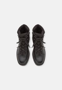 Tamaris Botines con plataforma - black