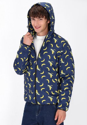 Marineblå posetjakke med bananmønster, lynlås og hætte. Stoffet er glat med en let blank finish.