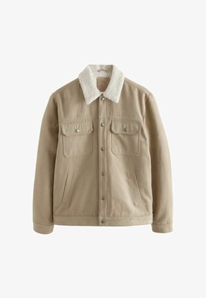 Beige jas met een zachte, witte, pluizige kraag. Heeft twee borstzakken, zijzakken en zilveren drukknoopjes. Gemaakt van katoen met een gladde textuur.