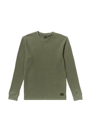 Olive green long-sleeve shirt with a ribbed texture, round neck, and stretchy cuffs. Features a small black and yellow brand label at the hem.