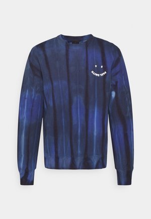 Granatowy sweter tie-dye z długimi rękawami, z ribbowanym mankietem i dołem, z białym graficznym uśmiechniętą buźką na klatce piersiowej.