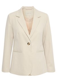 Blazer sur mesure couleur crème avec manches longues, col cranté, un bouton en écaille et deux poches passepoilées à l'avant.
