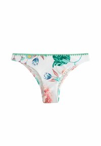 Chiloți tanga florali confecționați dintr-un material moale. Fundal alb cu modele florale roz și verzi. Vârful verde ondulat de-a lungul taliei.
