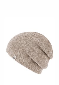 Beige knitted beanie made from soft, fuzzy material. Features a slouchy design with visible texture and a small brand tag accent.