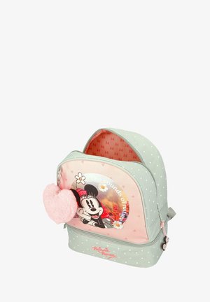 Mochila infantil con diseño de Minnie Mouse, lunares, llavero en forma de corazón rosa y texto "Los sonidos de la naturaleza" en el bolsillo frontal.