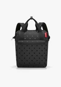 Selected, glossy dots black