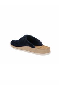 Scarpe da casa blu navy in peluche con tomaia testurizzata, suola intermedia in legno e suola in gomma bianca. Design aperto sul retro per una facile vestibilità.
