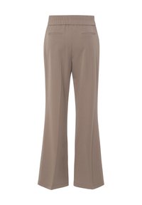 Beige wijde broek met een elastische tailleband, twee achterzakken en een zachte textuur. Flare uit vanaf de knie voor een ontspannen pasvorm.