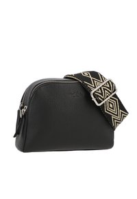 Black leather bag with a textured surface, featuring a zip closure and a patterned black and beige strap with a silver buckle.