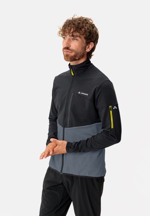 Black and gray zip-up jacket with a fitted design, a high collar, textured lower panel, and contrasting yellow accents on the zipper.