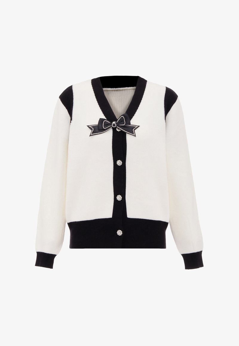 Vit och svart ribbade cardigan, med en djup V-ringning, en svart rosett med pärldetalj och sex dekorativa knappstängningar.
