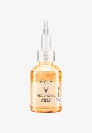 Klare Glasflasche mit einer Pipette, die ein golden-orange Serum enthält. Das Etikett zeigt "VICHY NEOVADIOL MENO 5 BI-SERUM" und das Logo.