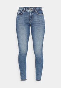 Högmidjade skinny-jeans i ljusblå denim. Har fem fickor, gylf med dragkedja och fåll med lätt frans.