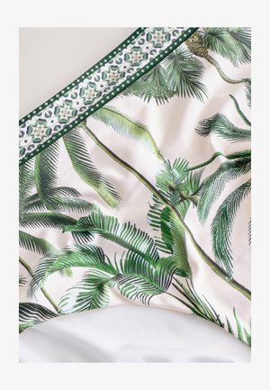 Mintás szövet, zöld pálmalevelekkel világos alapon, zöld és fehér geometrikus mintás díszítéssel szegélyezve.