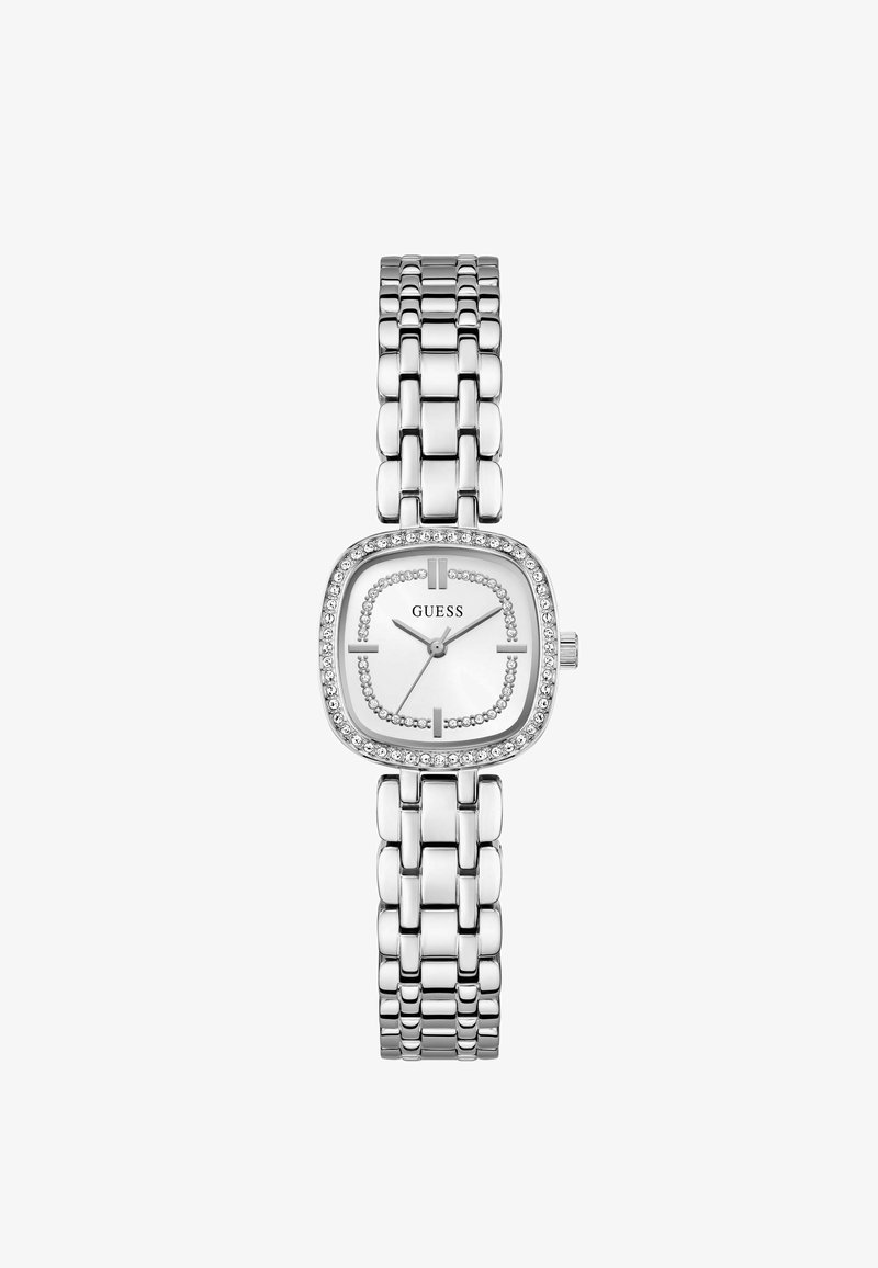 Montre femme Guess en argent avec cadran carré, lunette ornée de cristaux, bracelet en métal à maillons et cadran minimaliste à trois aiguilles.