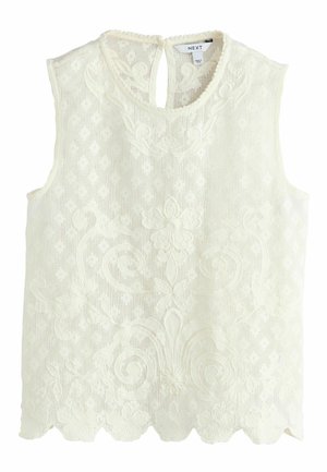 Sleeveless white lace blouse with floral embroidery, scalloped hem, round neckline with small back button closure.