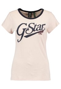 Jasnor�óżowa bawełniana koszulka z okrągłym dekoltem, krótkimi rękawami oraz granatowym logo "G-Star RAW" nadrukowanym na przodzie.