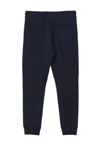 Navy Blausweatpants aus weichem Stoff, mit einem elastischen Bund und einer einzelnen Gesäßtasche mit flacher Nahtdetails.