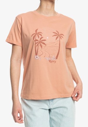 Peach-colored cotton t-shirt featuring a palm tree graphic, a sun, and flowers, with short sleeves and a crew neckline.
