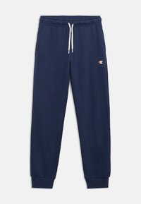 Σκούρο μπλε παντελόνι φόρμας από απαλό μείγμα βαμβακιού, με ελαστική μέση και λευκό κορδόνι, καθώς και μανσέτες στους αστραγάλους. Μικρό λογότυπο στο πόδι.